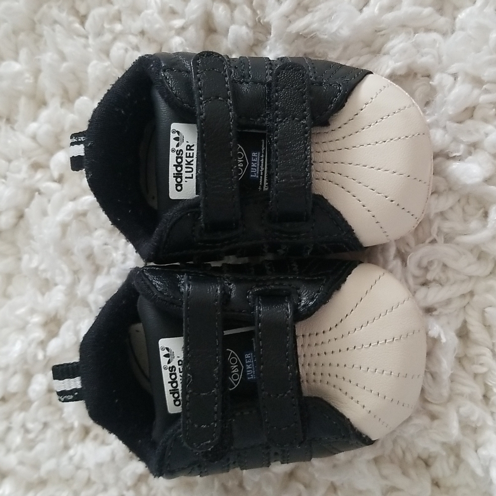 Adidas luker crib shoes.  Size 0.